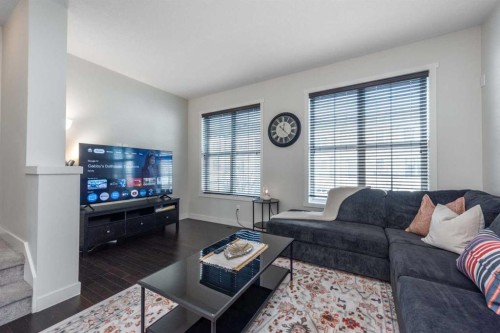 408 Nolanfield Villas Nw, Calgary, AB - Indoor Photo Showing Living Room