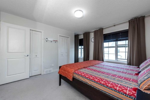 408 Nolanfield Villas Nw, Calgary, AB - Indoor Photo Showing Bedroom