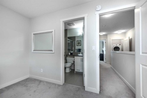 408 Nolanfield Villas Nw, Calgary, AB - Indoor Photo Showing Other Room