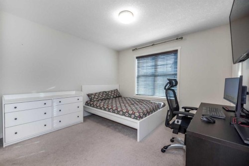 408 Nolanfield Villas Nw, Calgary, AB - Indoor Photo Showing Bedroom