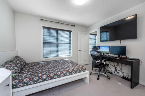 408 Nolanfield Villas Nw, Calgary, AB - Indoor Photo Showing Other Room