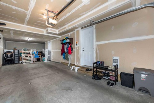 408 Nolanfield Villas Nw, Calgary, AB - Indoor Photo Showing Garage