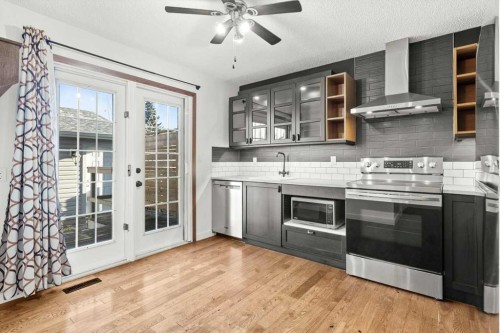 73 Sunvale Crescent Se, Calgary, AB - Indoor Photo Showing Kitchen With Upgraded Kitchen