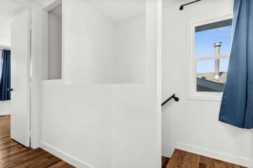 73 Sunvale Crescent Se, Calgary, AB - Indoor Photo Showing Other Room