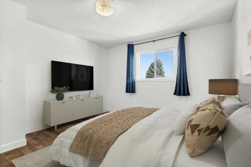 73 Sunvale Crescent Se, Calgary, AB - Indoor Photo Showing Bedroom