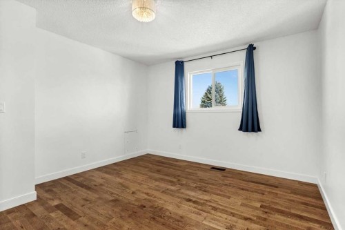 73 Sunvale Crescent Se, Calgary, AB - Indoor Photo Showing Other Room