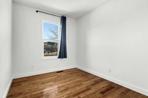 73 Sunvale Crescent Se, Calgary, AB - Indoor Photo Showing Other Room