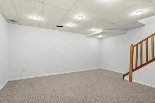 73 Sunvale Crescent Se, Calgary, AB - Indoor Photo Showing Other Room