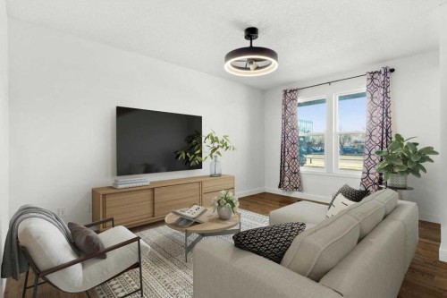 73 Sunvale Crescent Se, Calgary, AB - Indoor Photo Showing Living Room