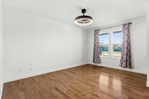 73 Sunvale Crescent Se, Calgary, AB - Indoor Photo Showing Other Room