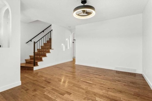 73 Sunvale Crescent Se, Calgary, AB - Indoor Photo Showing Other Room