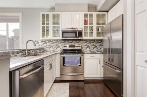201-3501 15 Street Sw, Calgary, AB - Indoor Photo Showing Kitchen With Stainless Steel Kitchen With Upgraded Kitchen