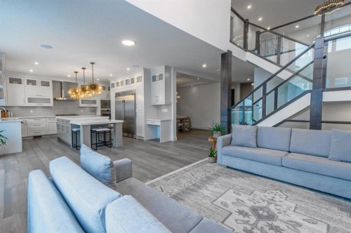 214 Aspenmere Green, Chestermere, AB - Indoor Photo Showing Living Room
