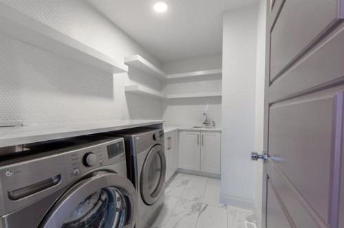 214 Aspenmere Green, Chestermere, AB - Indoor Photo Showing Laundry Room