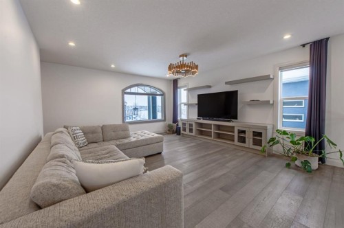 214 Aspenmere Green, Chestermere, AB - Indoor Photo Showing Living Room