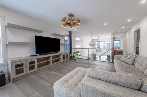 214 Aspenmere Green, Chestermere, AB - Indoor Photo Showing Living Room