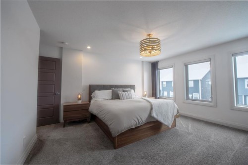 214 Aspenmere Green, Chestermere, AB - Indoor Photo Showing Bedroom