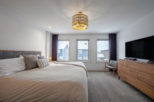 214 Aspenmere Green, Chestermere, AB - Indoor Photo Showing Bedroom
