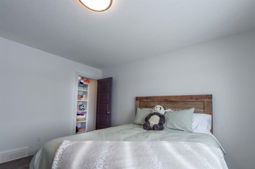 214 Aspenmere Green, Chestermere, AB - Indoor Photo Showing Bedroom