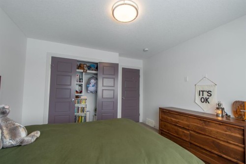 214 Aspenmere Green, Chestermere, AB - Indoor Photo Showing Bedroom