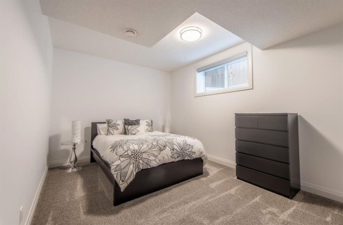 214 Aspenmere Green, Chestermere, AB - Indoor Photo Showing Bedroom