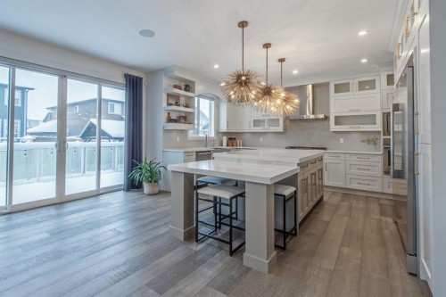 214 Aspenmere Green, Chestermere, AB - Indoor Photo Showing Kitchen With Upgraded Kitchen