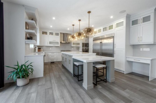 214 Aspenmere Green, Chestermere, AB - Indoor Photo Showing Kitchen With Upgraded Kitchen