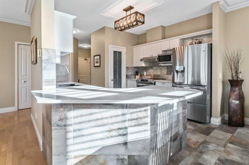 1204-1204 Lake Fraser Court Se, Calgary, AB - Indoor Photo Showing Kitchen With Stainless Steel Kitchen