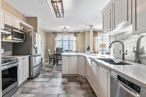 1204-1204 Lake Fraser Court Se, Calgary, AB - Indoor Photo Showing Kitchen With Stainless Steel Kitchen With Double Sink With Upgraded Kitchen