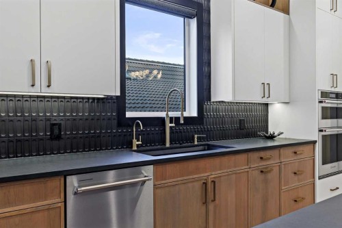 727 53Rd Avenue Sw, Calgary, AB - Indoor Photo Showing Kitchen With Double Sink