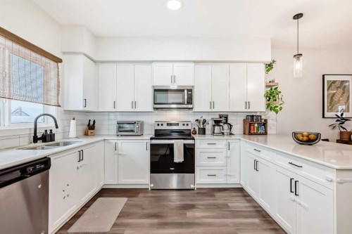 231 Legacy Glen Way Se, Calgary, AB - Indoor Photo Showing Kitchen With Double Sink With Upgraded Kitchen