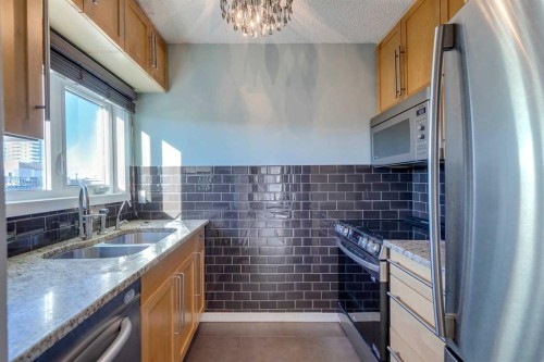 404-1334 12 Avenue Sw, Calgary, AB - Indoor Photo Showing Kitchen With Double Sink