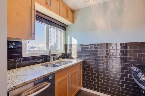 404-1334 12 Avenue Sw, Calgary, AB - Indoor Photo Showing Kitchen With Double Sink