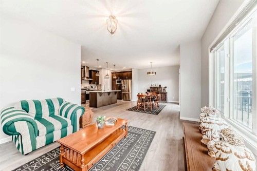 151 Sundown Way, Cochrane, AB - Indoor Photo Showing Living Room