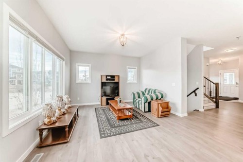 151 Sundown Way, Cochrane, AB - Indoor Photo Showing Living Room