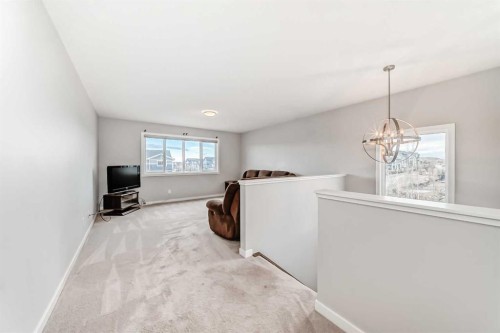 151 Sundown Way, Cochrane, AB - Indoor Photo Showing Other Room