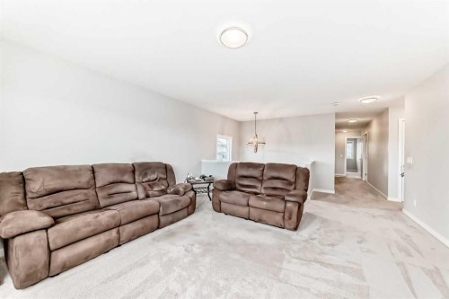 151 Sundown Way, Cochrane, AB - Indoor Photo Showing Living Room