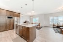 151 Sundown Way, Cochrane, AB  - Indoor Photo Showing Kitchen With Upgraded Kitchen 