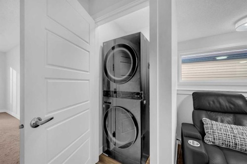208 Cornergate Row Ne, Calgary, AB - Indoor Photo Showing Laundry Room