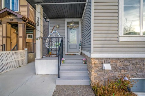 208 Cornergate Row Ne, Calgary, AB - Outdoor With Deck Patio Veranda