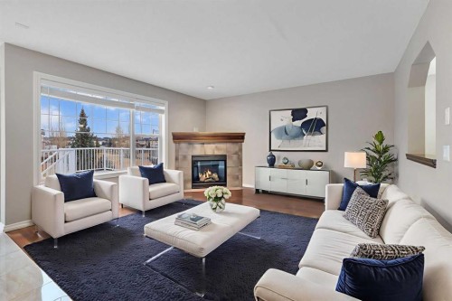 161 Silverado Range Cove Sw, Calgary, AB - Indoor Photo Showing Living Room With Fireplace
