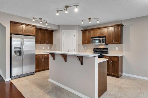 161 Silverado Range Cove Sw, Calgary, AB - Indoor Photo Showing Kitchen