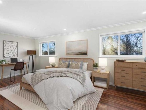 107 Woodford Crescent Sw, Calgary, AB - Indoor Photo Showing Bedroom