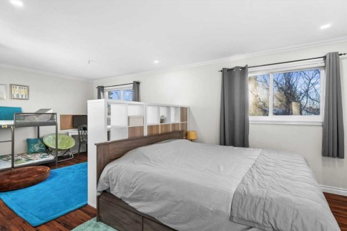 107 Woodford Crescent Sw, Calgary, AB - Indoor Photo Showing Bedroom