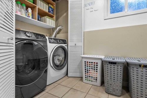 107 Woodford Crescent Sw, Calgary, AB - Indoor Photo Showing Laundry Room