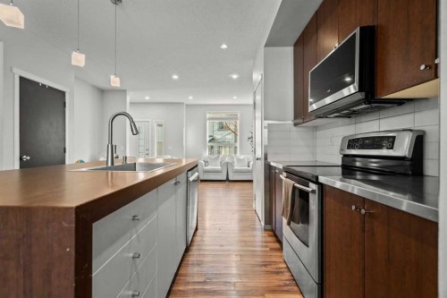 179 Copperstone Cove Se, Calgary, AB - Indoor Photo Showing Kitchen With Upgraded Kitchen