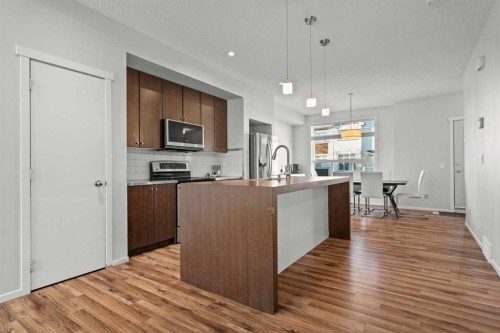 179 Copperstone Cove Se, Calgary, AB - Indoor Photo Showing Kitchen With Upgraded Kitchen