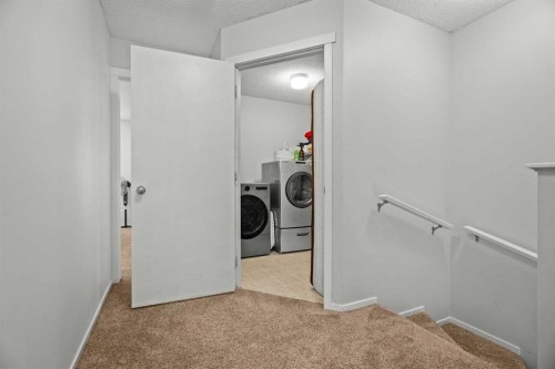 179 Copperstone Cove Se, Calgary, AB - Indoor Photo Showing Laundry Room