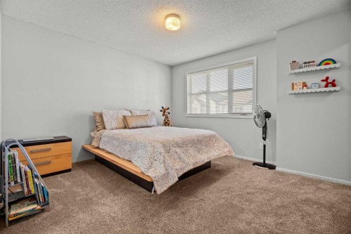 179 Copperstone Cove Se, Calgary, AB - Indoor Photo Showing Bedroom