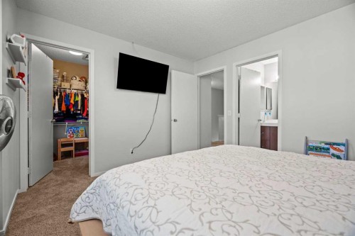 179 Copperstone Cove Se, Calgary, AB - Indoor Photo Showing Bedroom